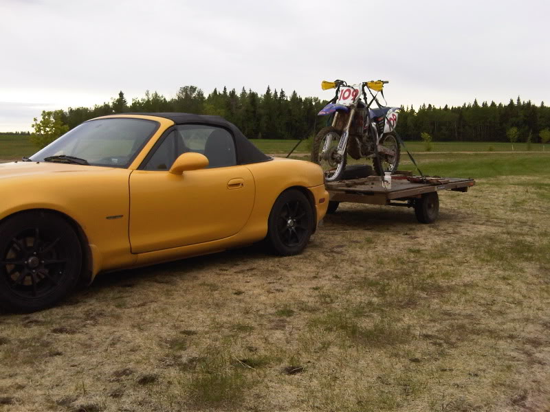 Name:  miatatowyz450.jpg
Views: 405
Size:  97.5 KB