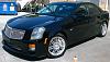 "upgraded" from a BMW to a GM car-shiny-caddy.jpg
