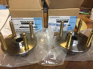Mazda Comp front roller bearing hubs and rear hubs with long studs (new)-img_5436.jpg