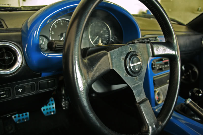 Mazdaspeed steering wheel, NRG qr, rx7 injectors,Custom Ruca, cage 